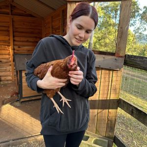 Rescued chicken and her sponsor